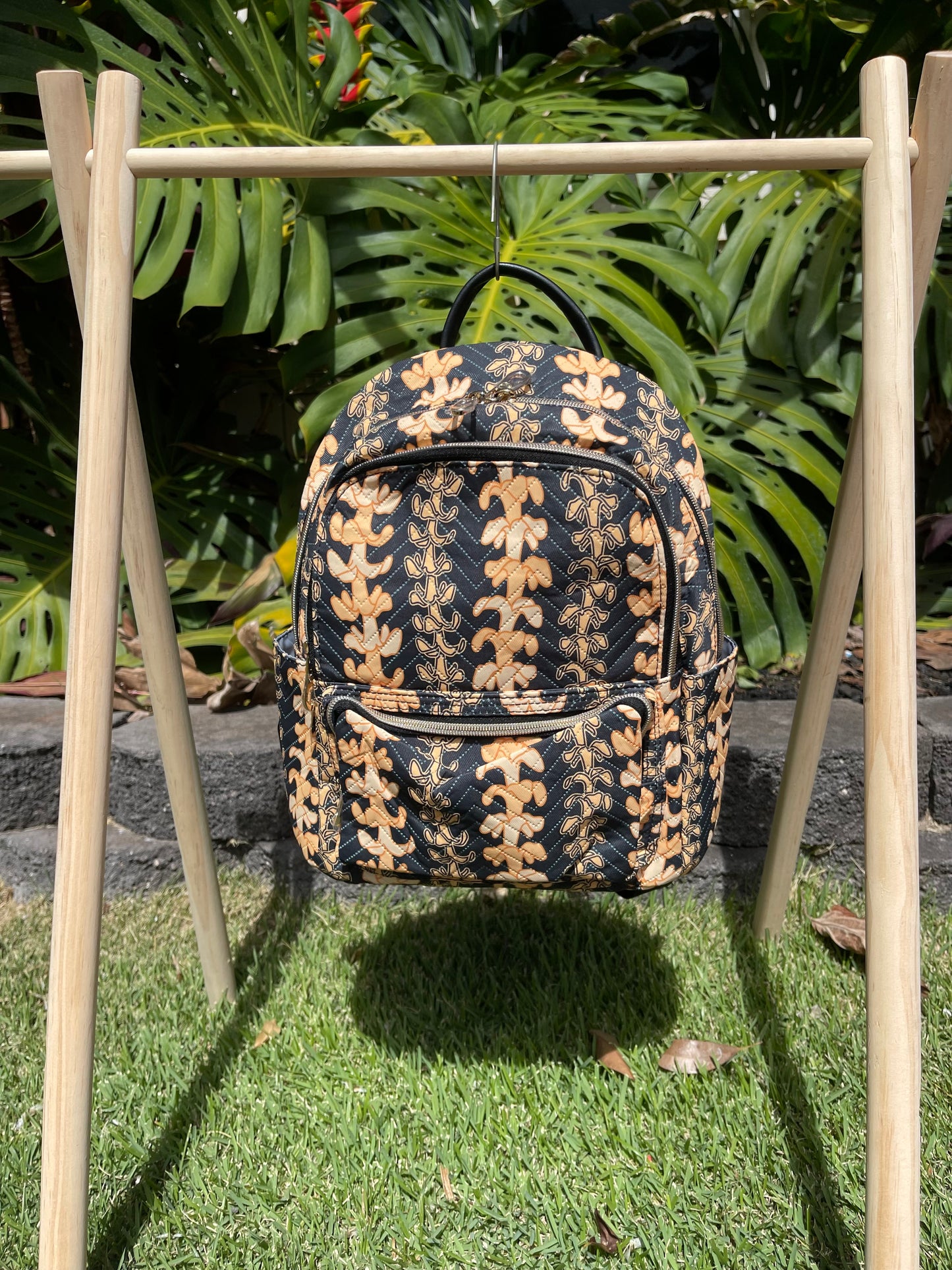 Black and Orange Puakenikeni Backpack